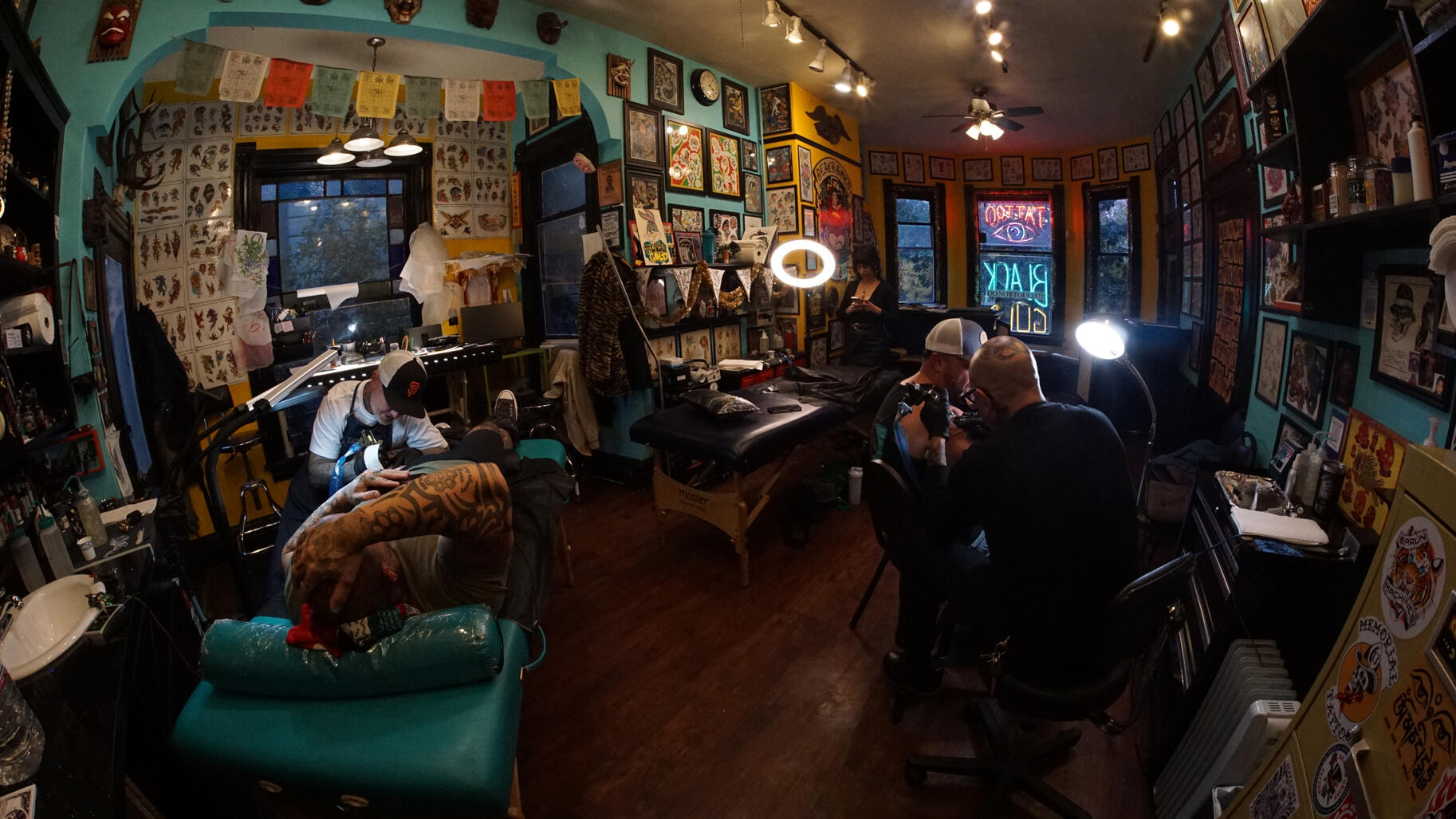 Black Gold Tattoo, artists at work in the tattoo shop Staff artists at work in Black Gold Tattoo, a Midtown Sacramento tattoo shop located at 2421 J Street, established in 2013, known for Traditional, Japanese, Fine-Line, and Custom Tattoos