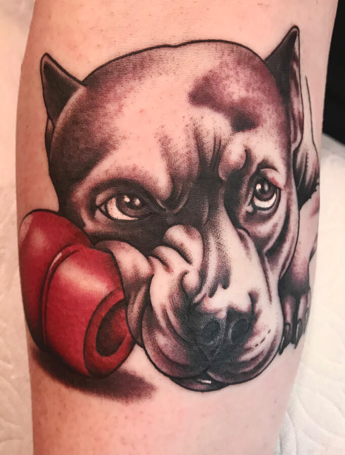 Black and gray dog portrait tattoo Realistic dog portrait tattoo done in black and gray